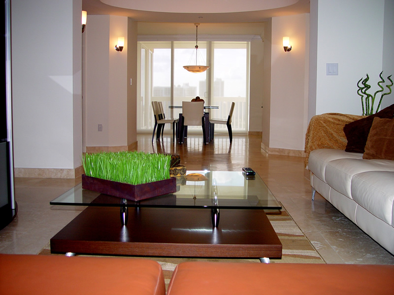 living room and dining room together on Living Room And A Dining Room Brought Together By The Elegant Cream